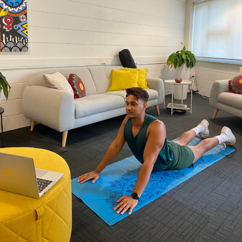 Person doing yoga in an office