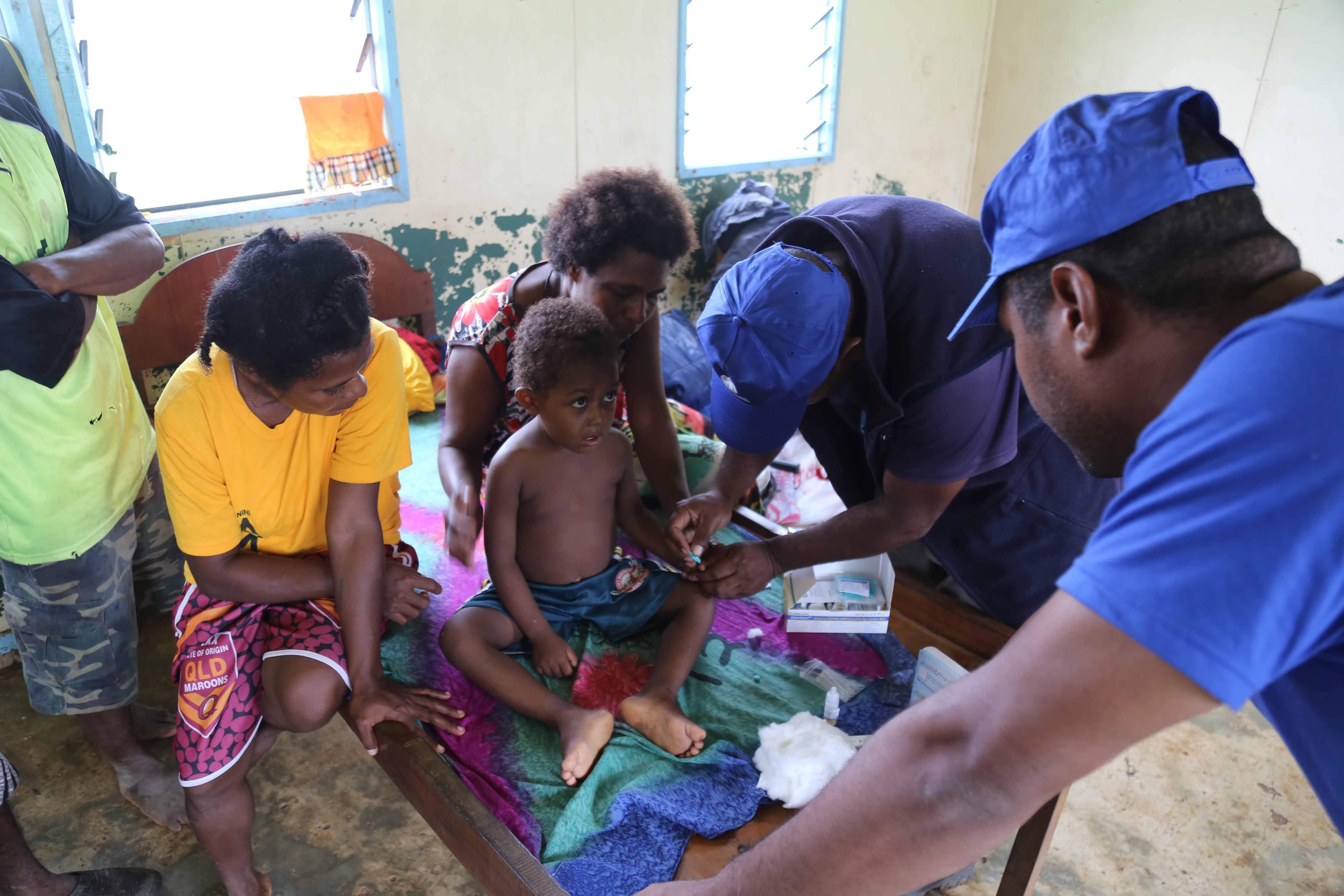 Team from FEiA conducting a medical home visit